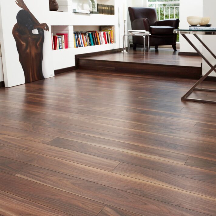 In situ image of Dark Walnut laminate flooring in a modern open space living room