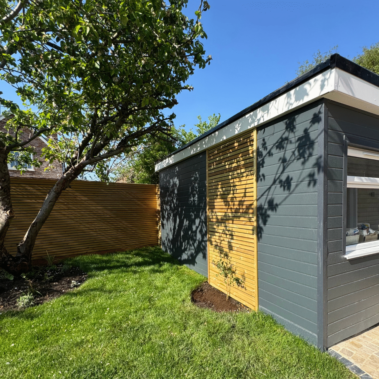 Renovated garden home using external cladding